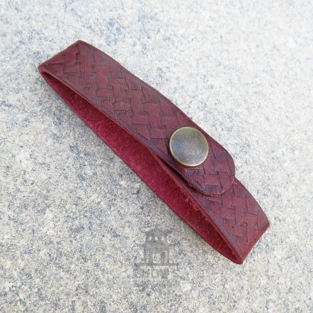 Dark red leather tankard loop with interlaced Celtic knot embossing