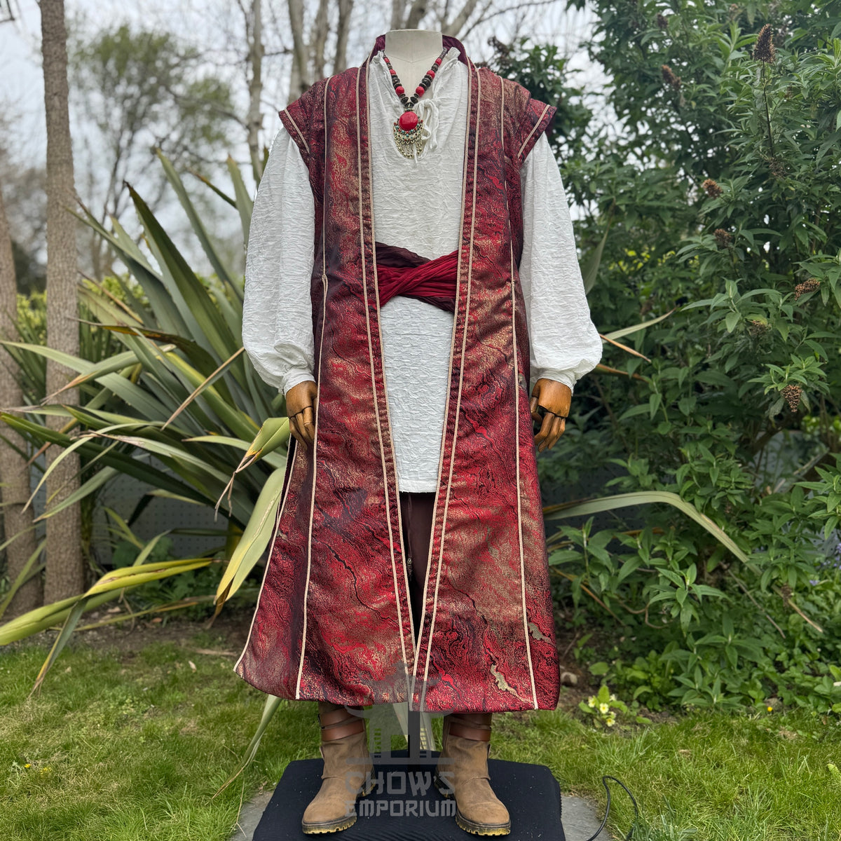 Three-quarter view of the crimson LARP outfit set with sash tied at the waist