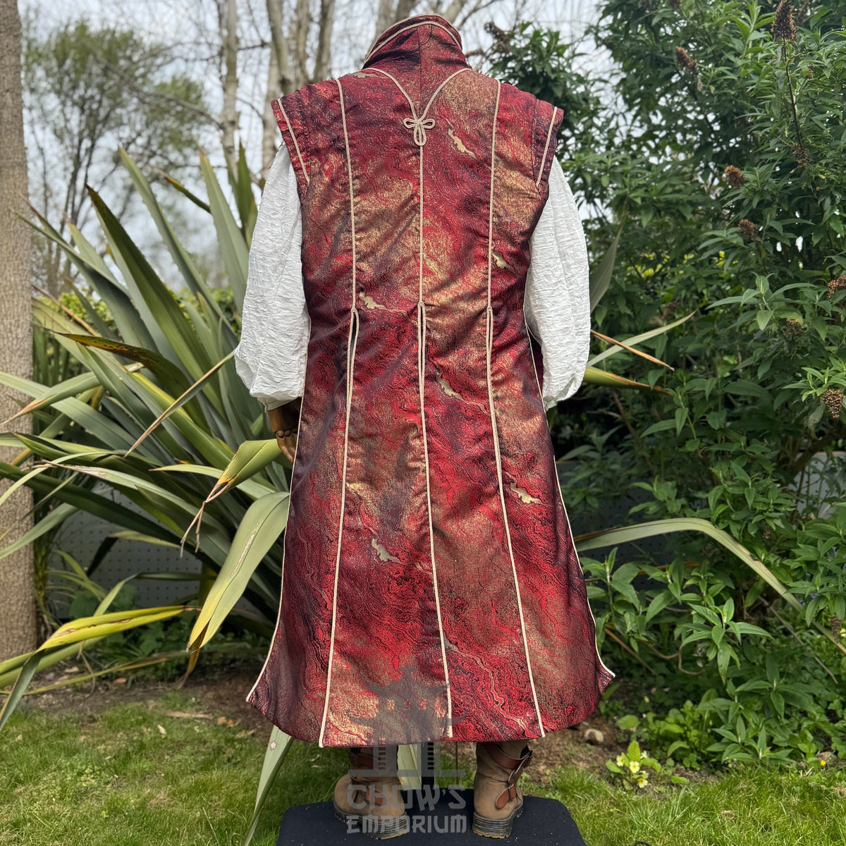 Rear view of the marbled crimson waistcoat showing panel construction