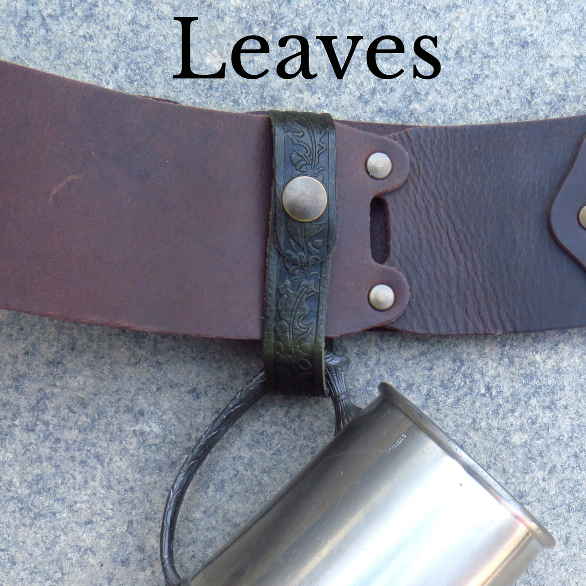 Dark brown leather tankard loop on a belt with a tankard hanging from it