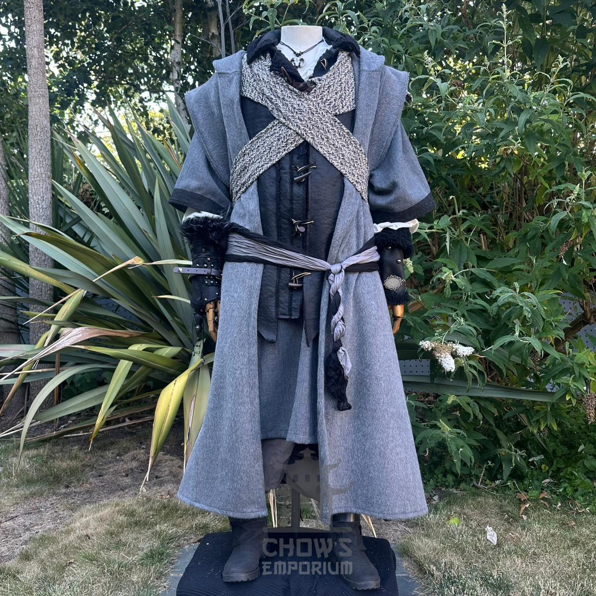 Mountain Ranger LARP outfit worn, grey hooded robe over black faux leather waistcoat with vambraces and sash