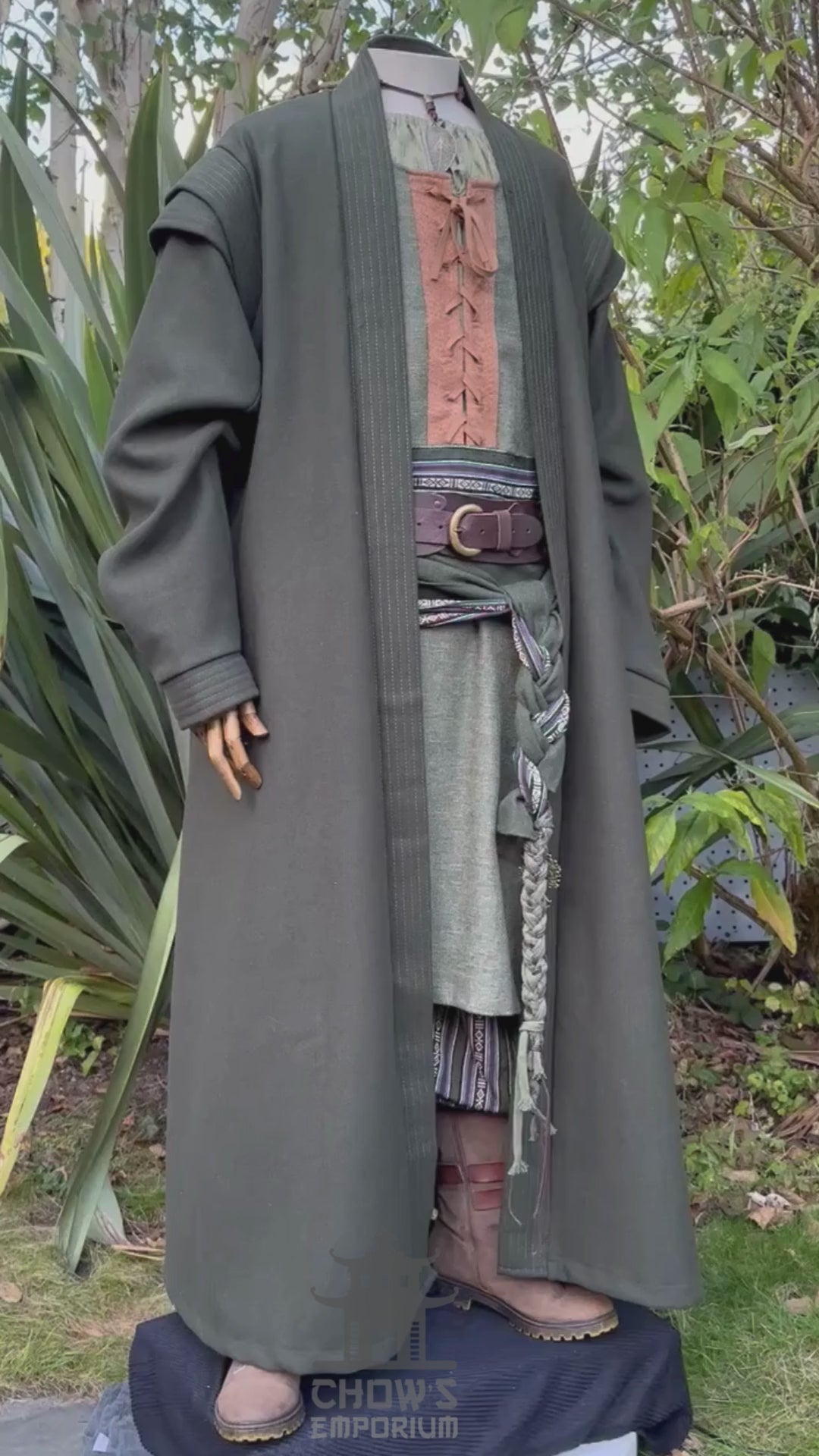 Side view of green medieval LARP robe worn open, fantasy cosplay costume for rangers, wizards, or knights at Renaissance Faires.