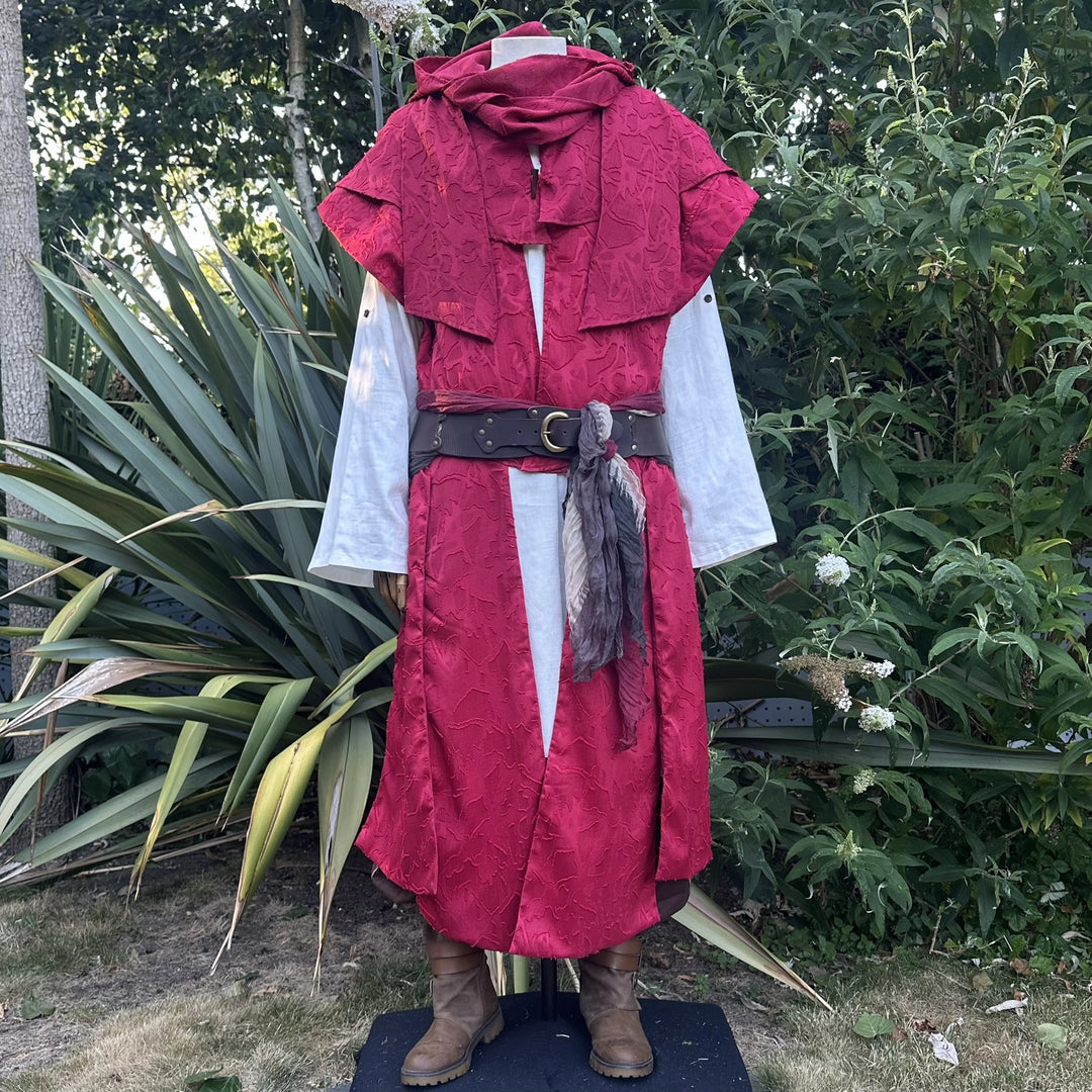Red panelled waistcoat with the hood down as a cowl at the neck, front view. Shirt and belt sold separately.