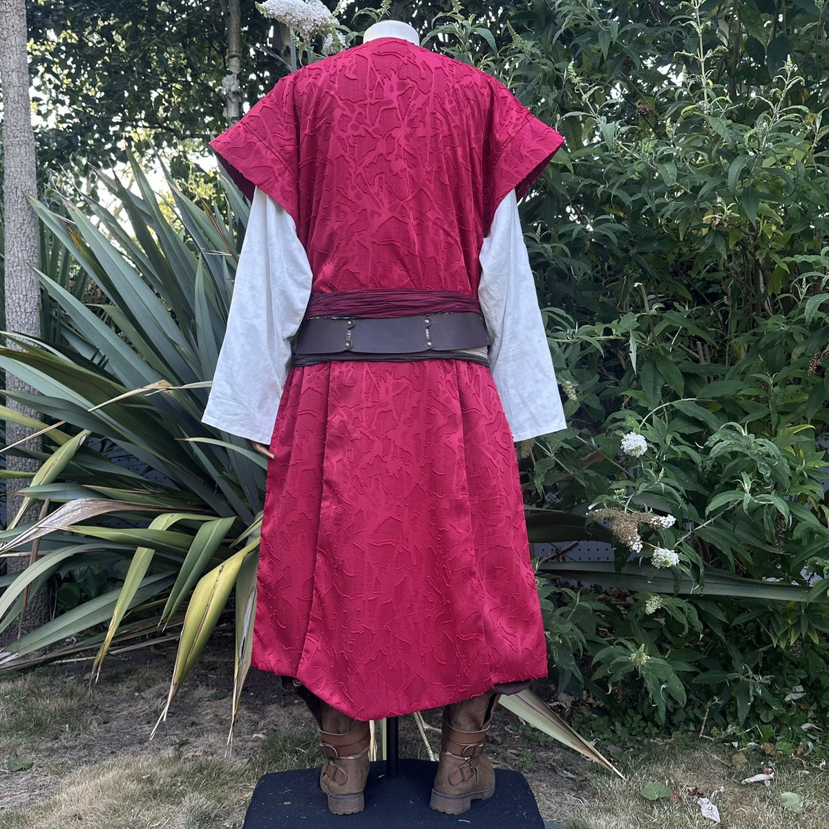 Red panelled waistcoat and hood set, hood down, back view showing the panelled back. Belt sold separately.