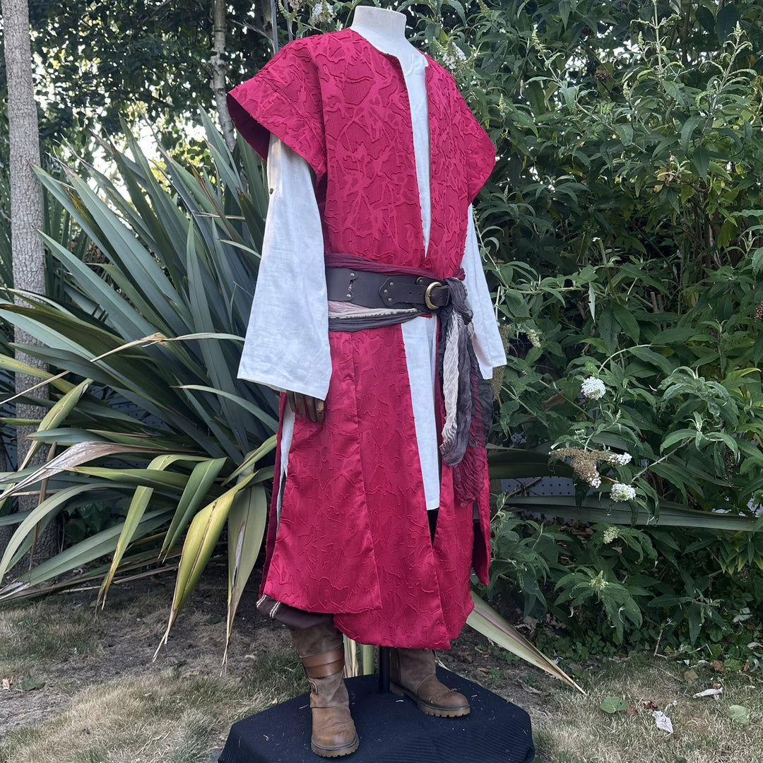 Red panelled waistcoat and hood set, hood down, three-quarter view. Belt sold separately.