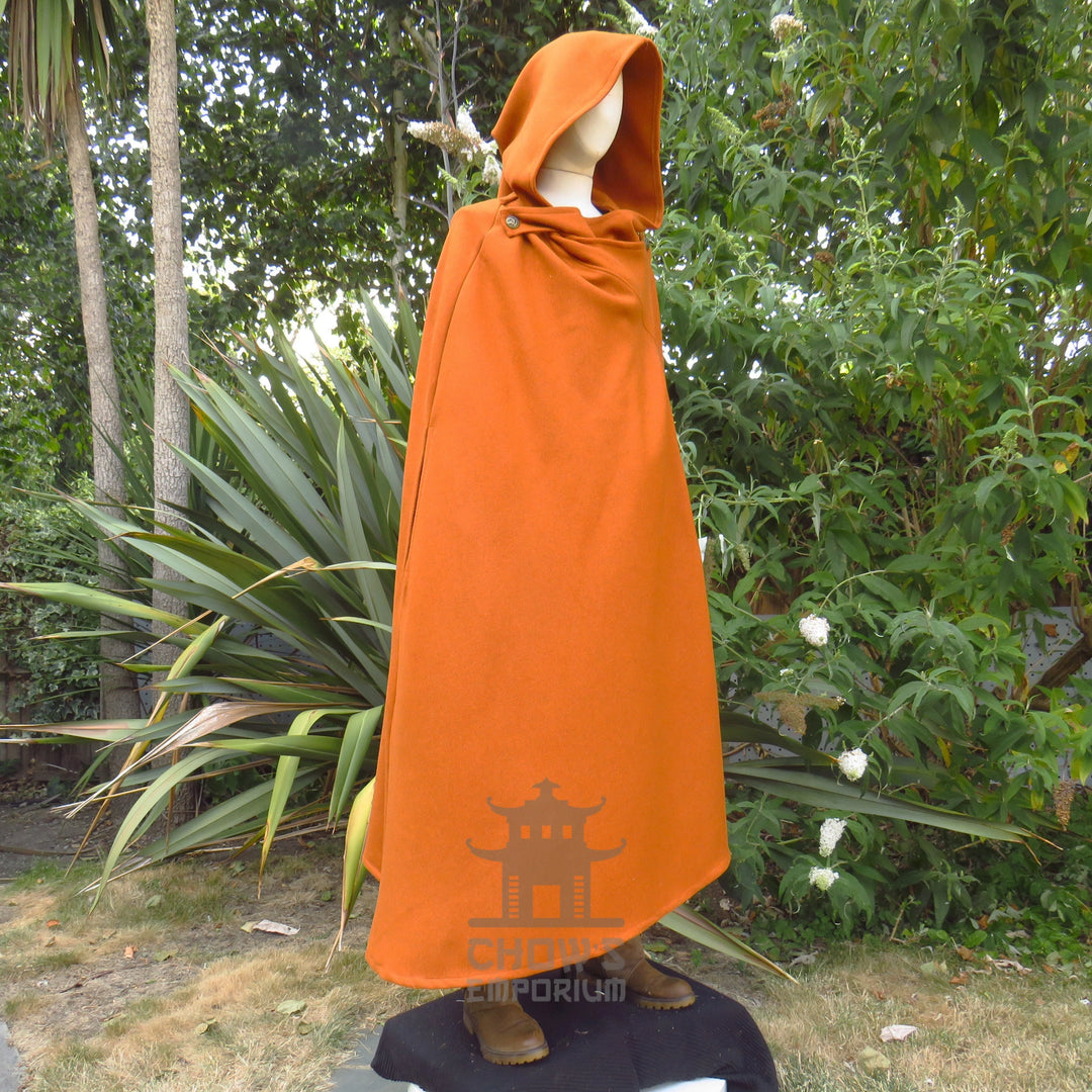 Rust medieval cloak with the hood raised, turned to show the drape at the side