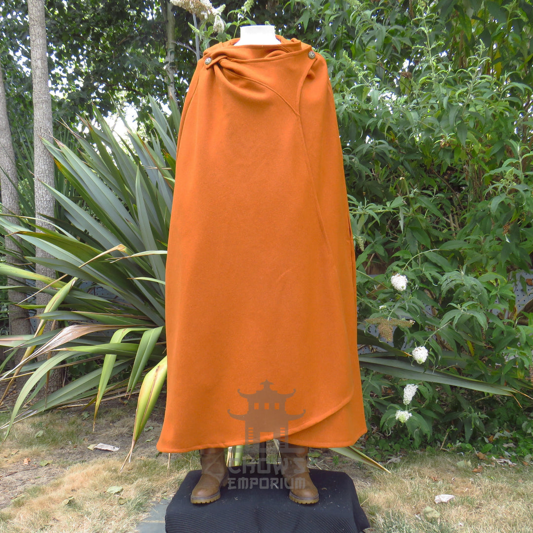 Rust wool cloak fastened closed with the hood gathered down at the neck