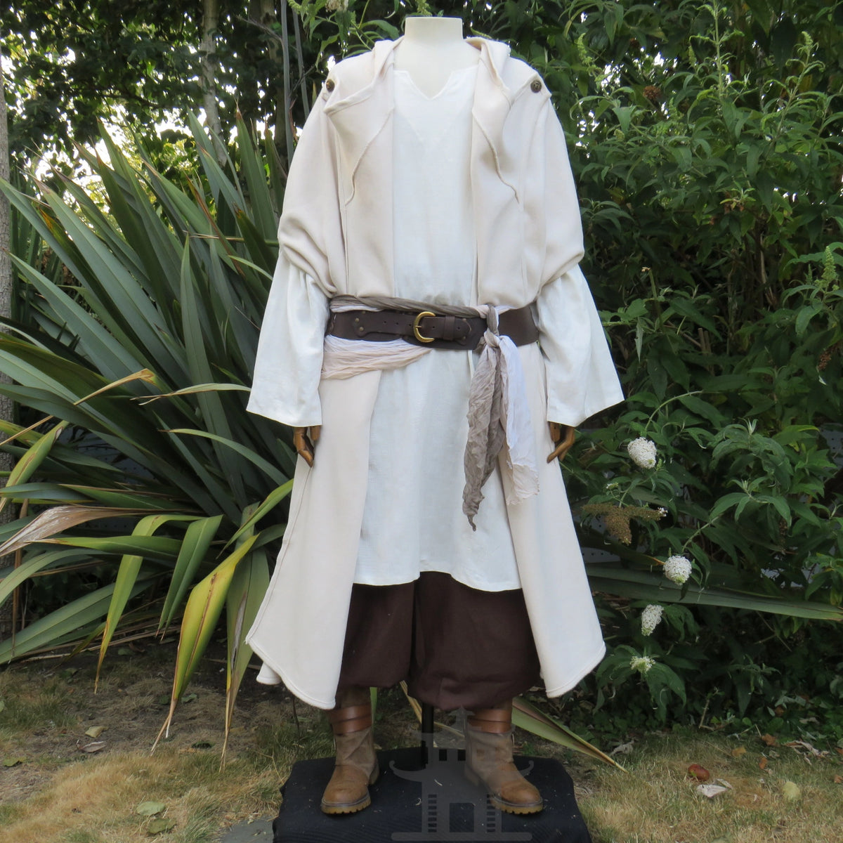 White cloak completing a full pale costume with belt and trousers, other pieces sold separately