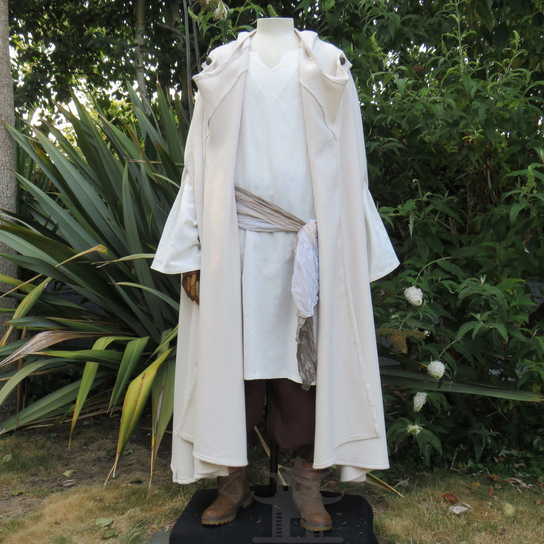 White wool cloak worn open as part of a pale layered costume, other pieces sold separately