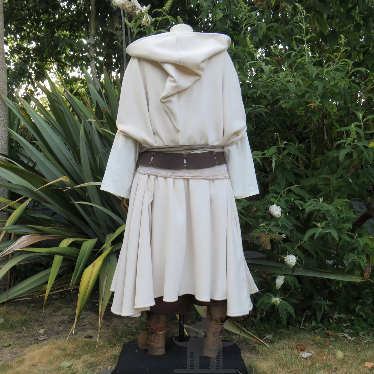 White medieval cloak worn belted over a tunic, belt and tunic sold separately