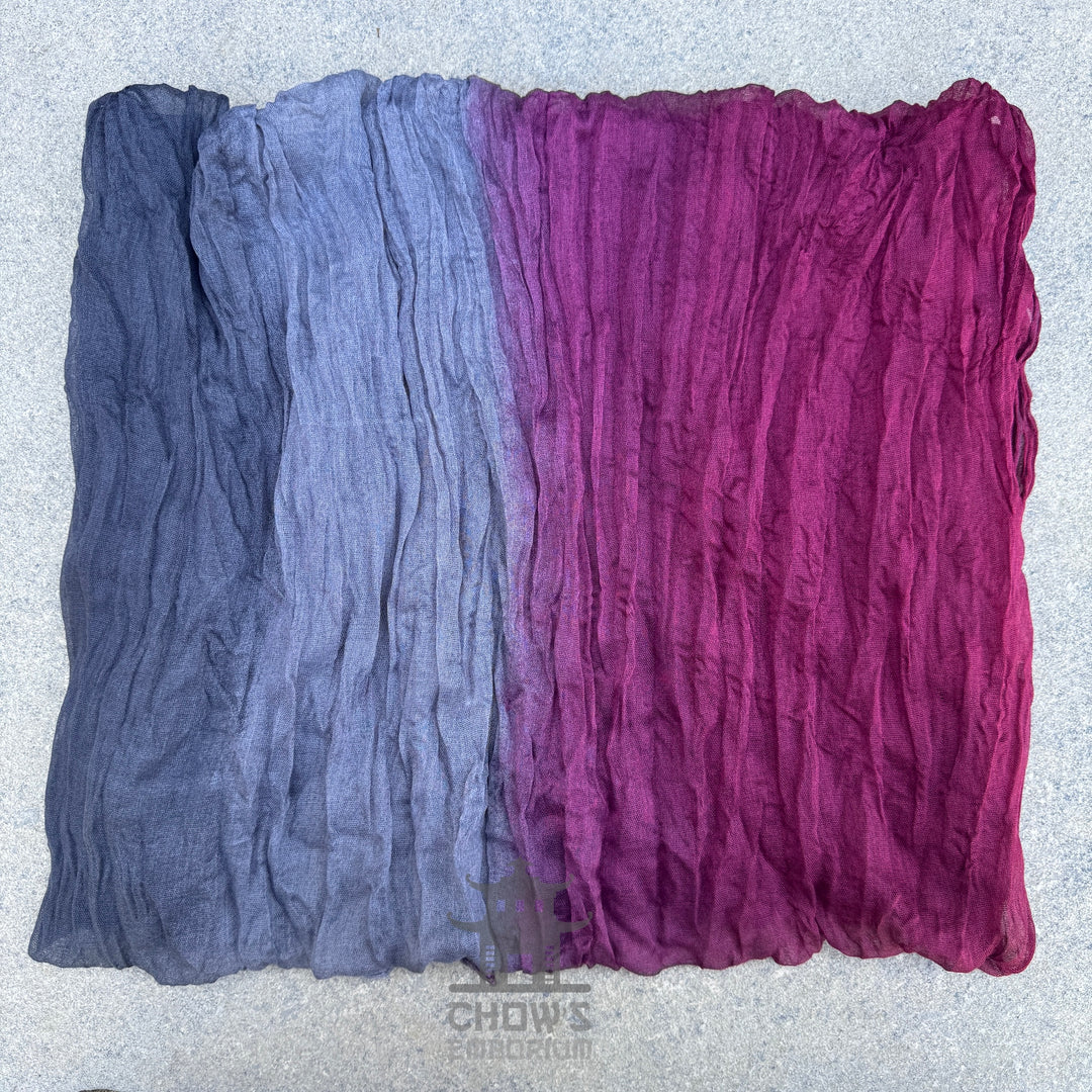 Folded Wine pirate sash showing slate blue to wine red gradient