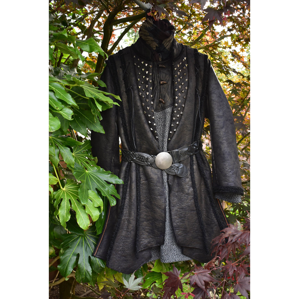 faux leather viking coat with stud accents for LARP, cosplay, ren faire.