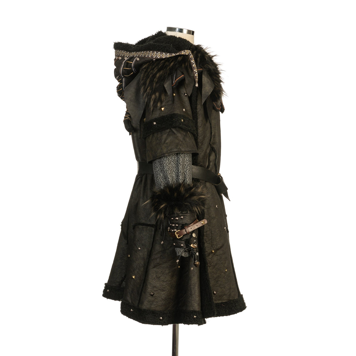 Side view of medieval LARP vambrace, faux fur detail and cloak in black.