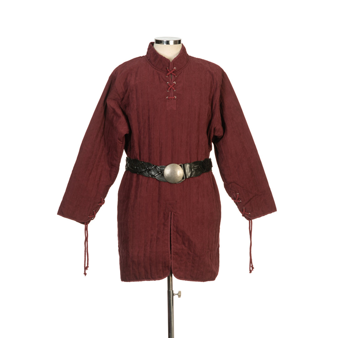 This Thin LARP Gambeson comes in Red Cotton. This Padded Tunic can sit on top of the rest of your kit. This Lightweight Gambeson is water resistant and keeps you warm. This Viking Tunic is perfect for your LARP Costume and LARP Character, Cosplay Events, and Ren Faires.