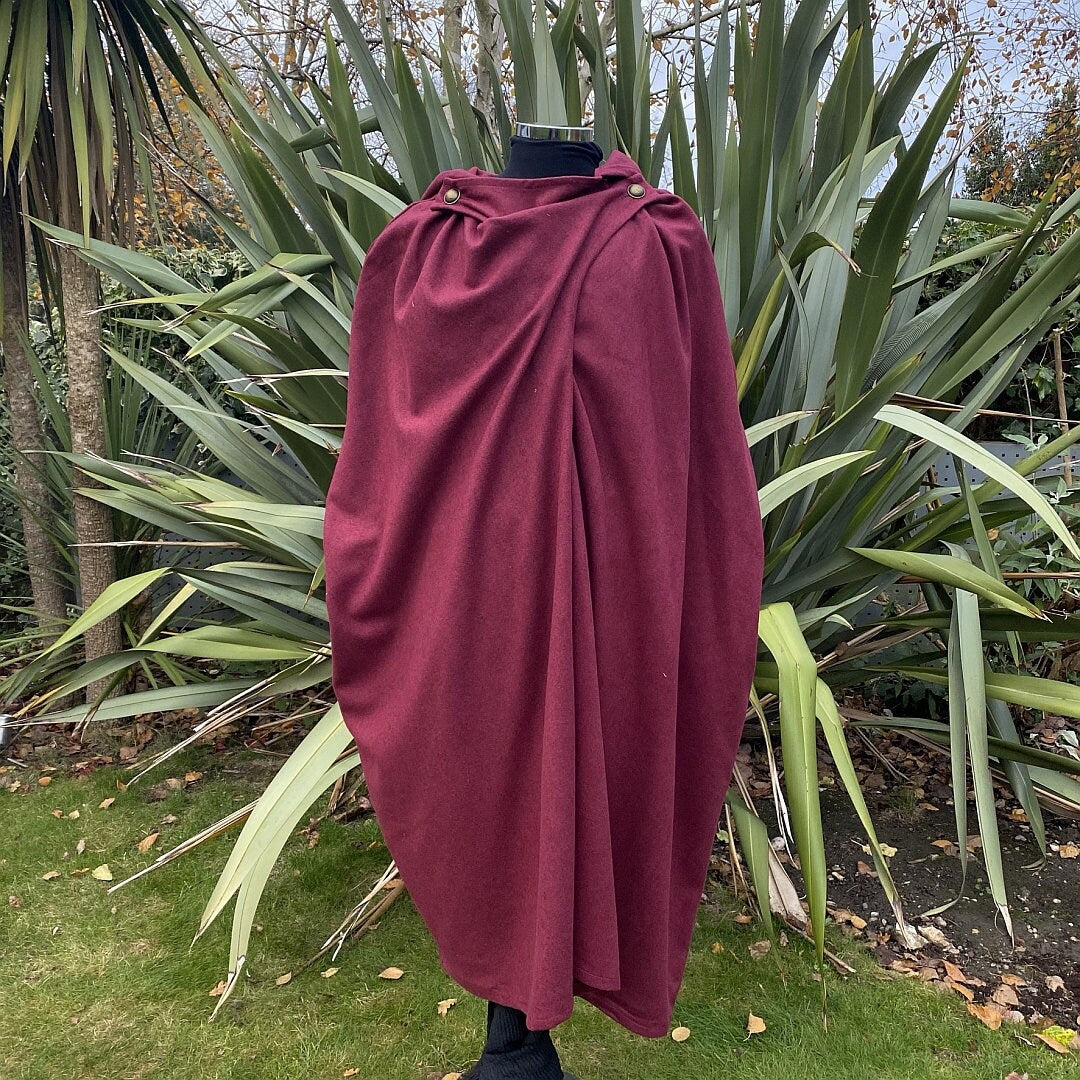 Dark red LARP cloak draped on mannequin.