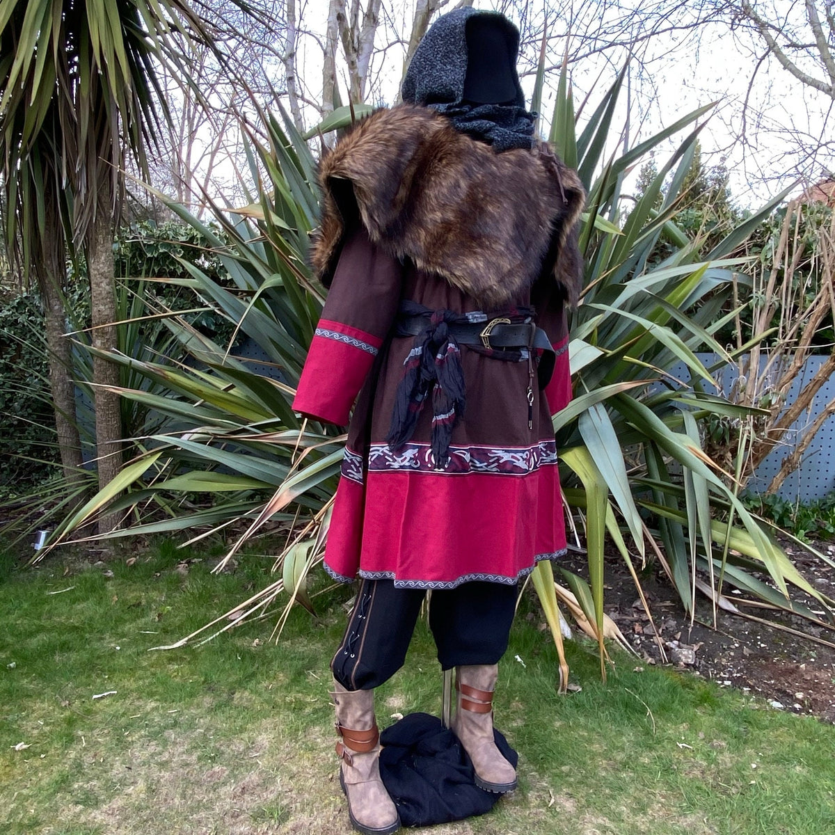 LARP medieval outfit with faux fur mantle, side view.