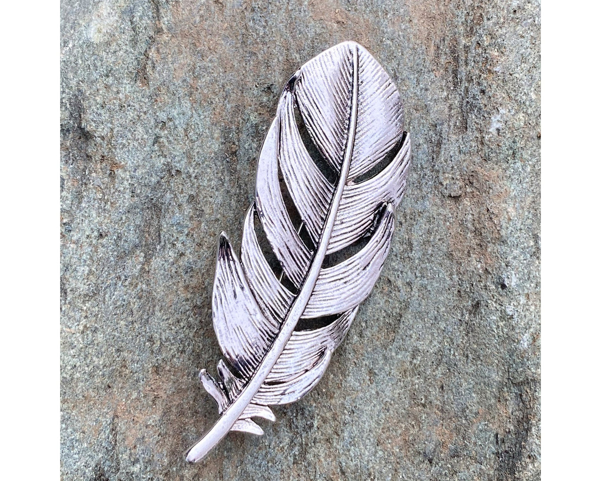 Silver feather brooch on stone, detailed veins for LARP.
