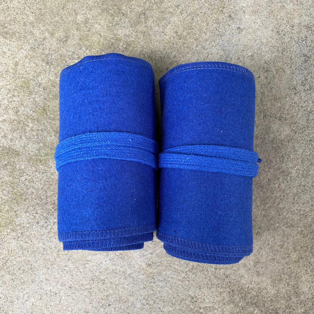 Set of Medieval LARPing Leg Wraps. They are Blue and made out of a Wool mixture which are used to keep Trouser flares out of the way and legs warm. These Viking Wraps can wrap around your Legs to provide an extra flare to LARP kit.