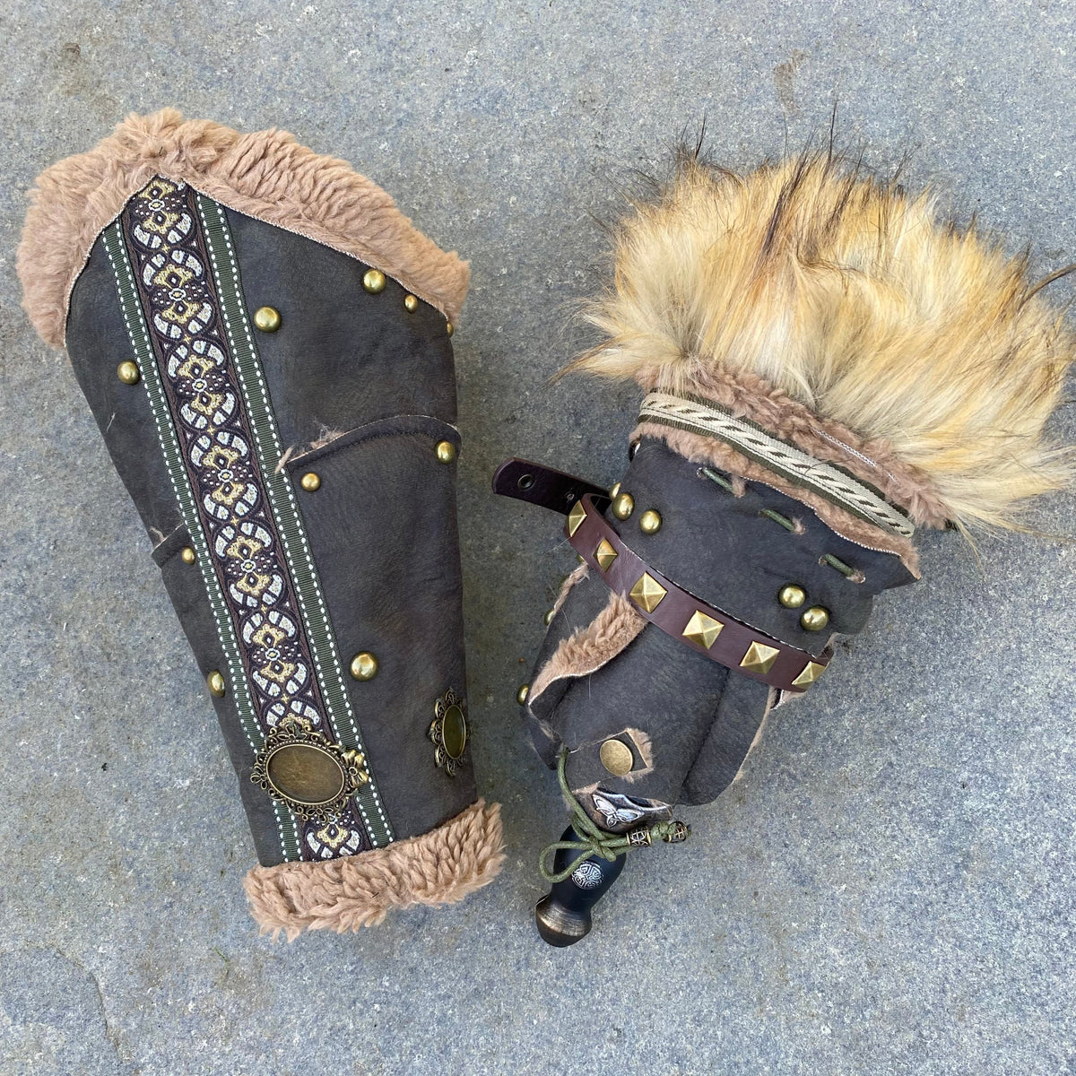 LARP vambraces with studded detail, faux fur lining, intricate patterns.