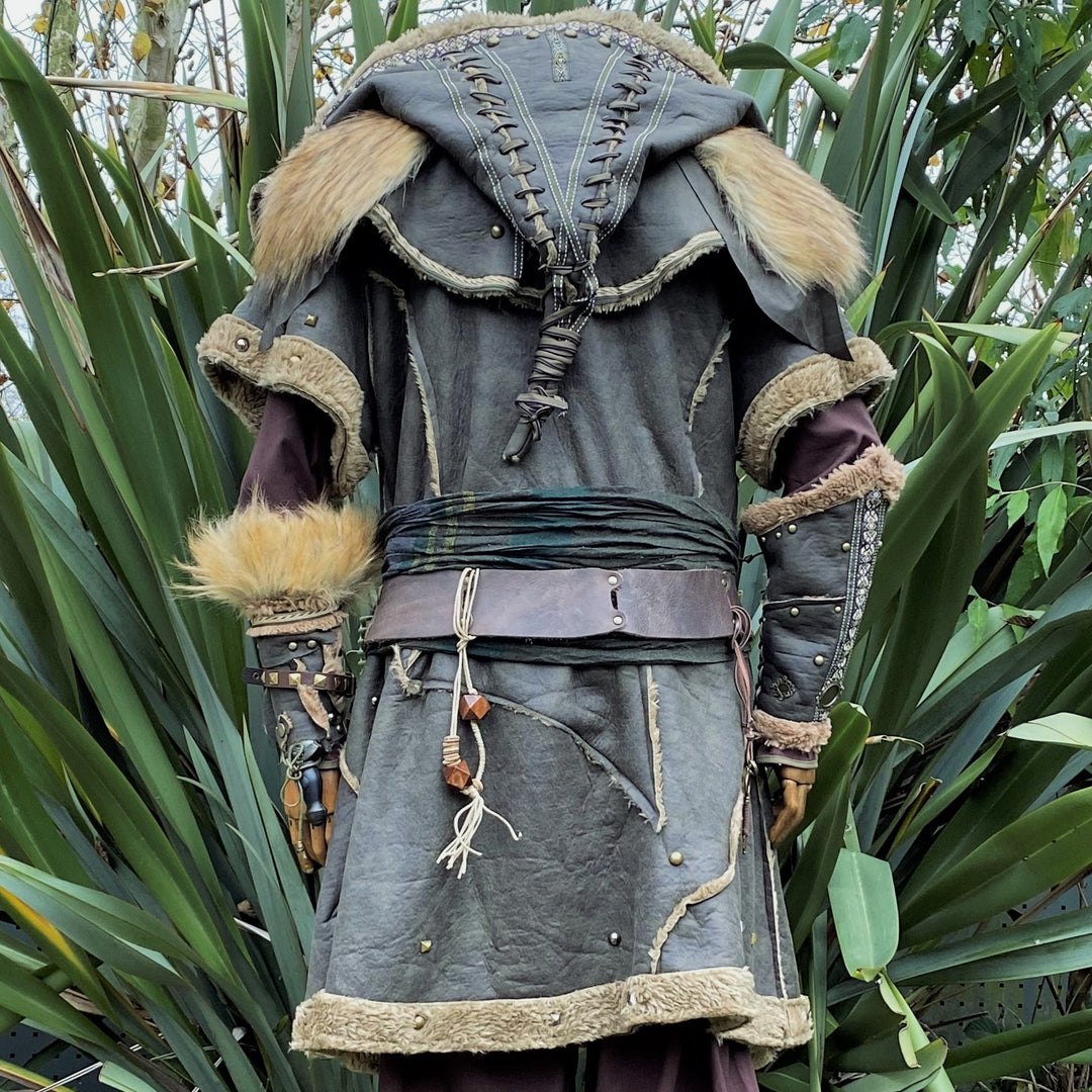 Rear view of medieval LARP set with fur trim, detailed hood, and vambraces.