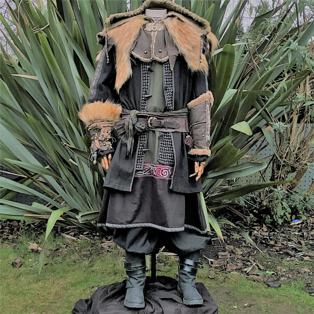 Front view of medieval LARP outfit with fur details and intricate trim.