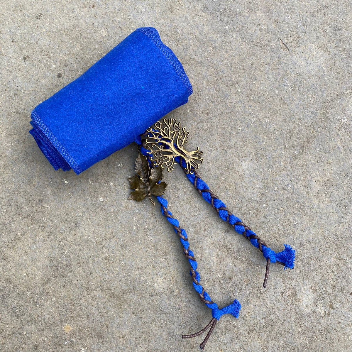 Blue wool sash with braided ties and brass leaf detail for LARP.
