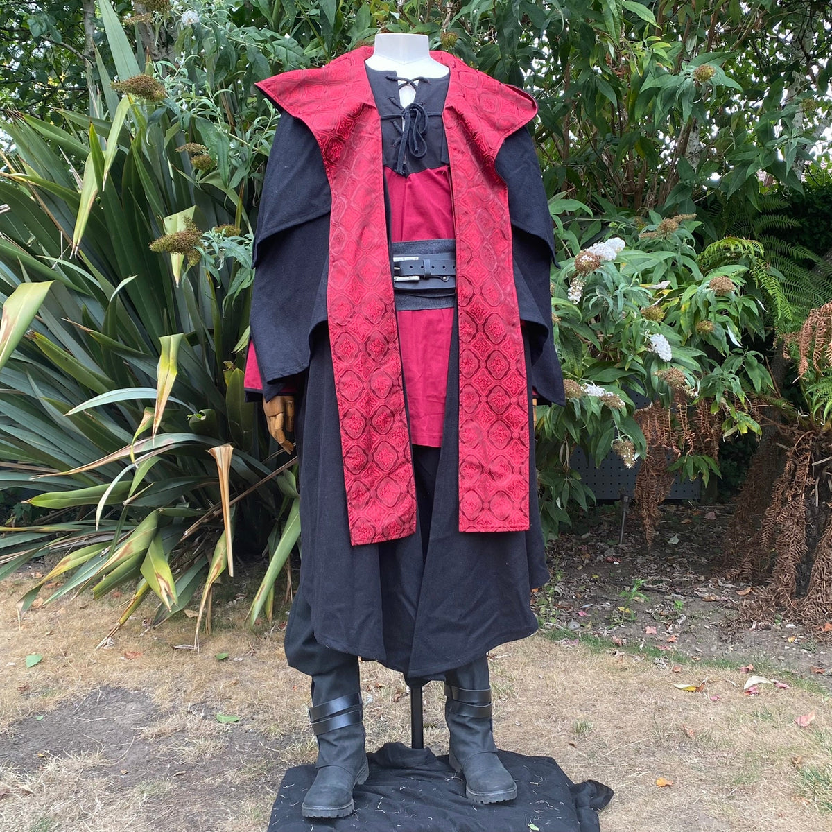 Blood Mage LARP set with black cloak, red shirt, and belt.