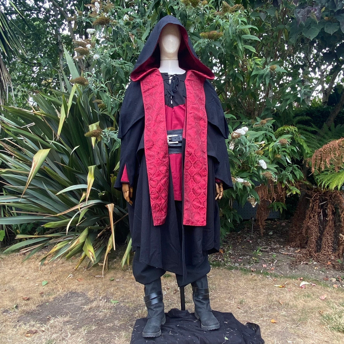 LARP Blood Mage set with red shirt, black cloak, quilted trim, and leather belt.