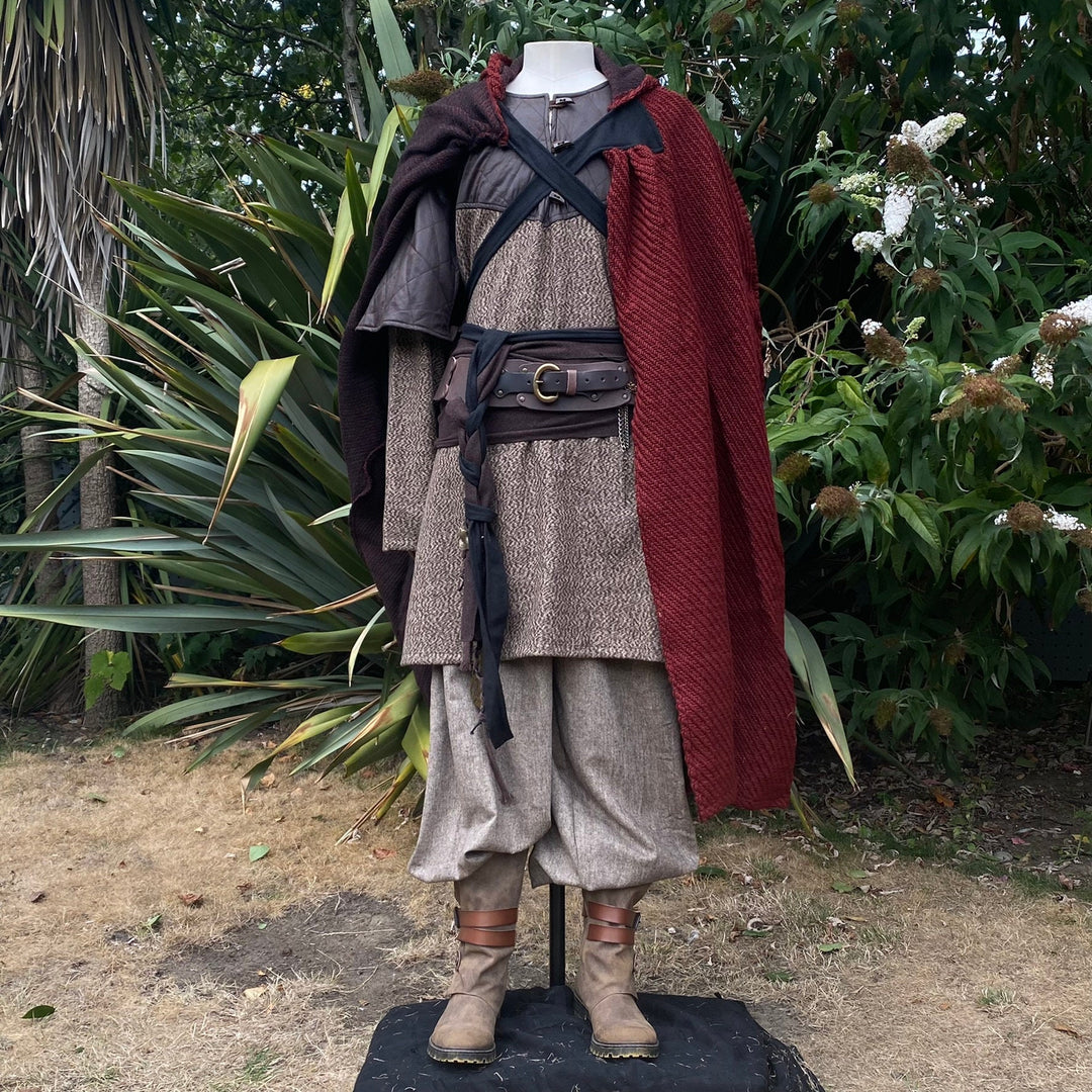 Viking LARP outfit front view: red-cloaked mannequin.