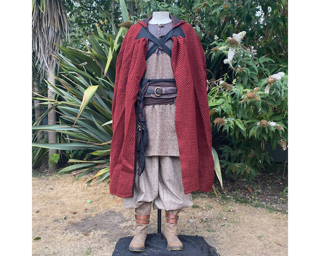 Viking LARP outfit front view, red cloak over brown tunic and trousers.