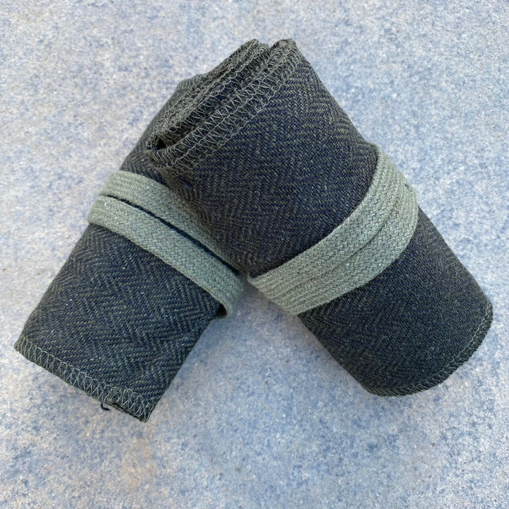 Set of Medieval LARPing Leg Wraps. They are Green & Black and made out of a Herringbone Wool mixture which are used to keep Trouser flares out of the way and legs warm. These Viking Wraps can wrap around your Legs to provide extra flare to LARP kit.