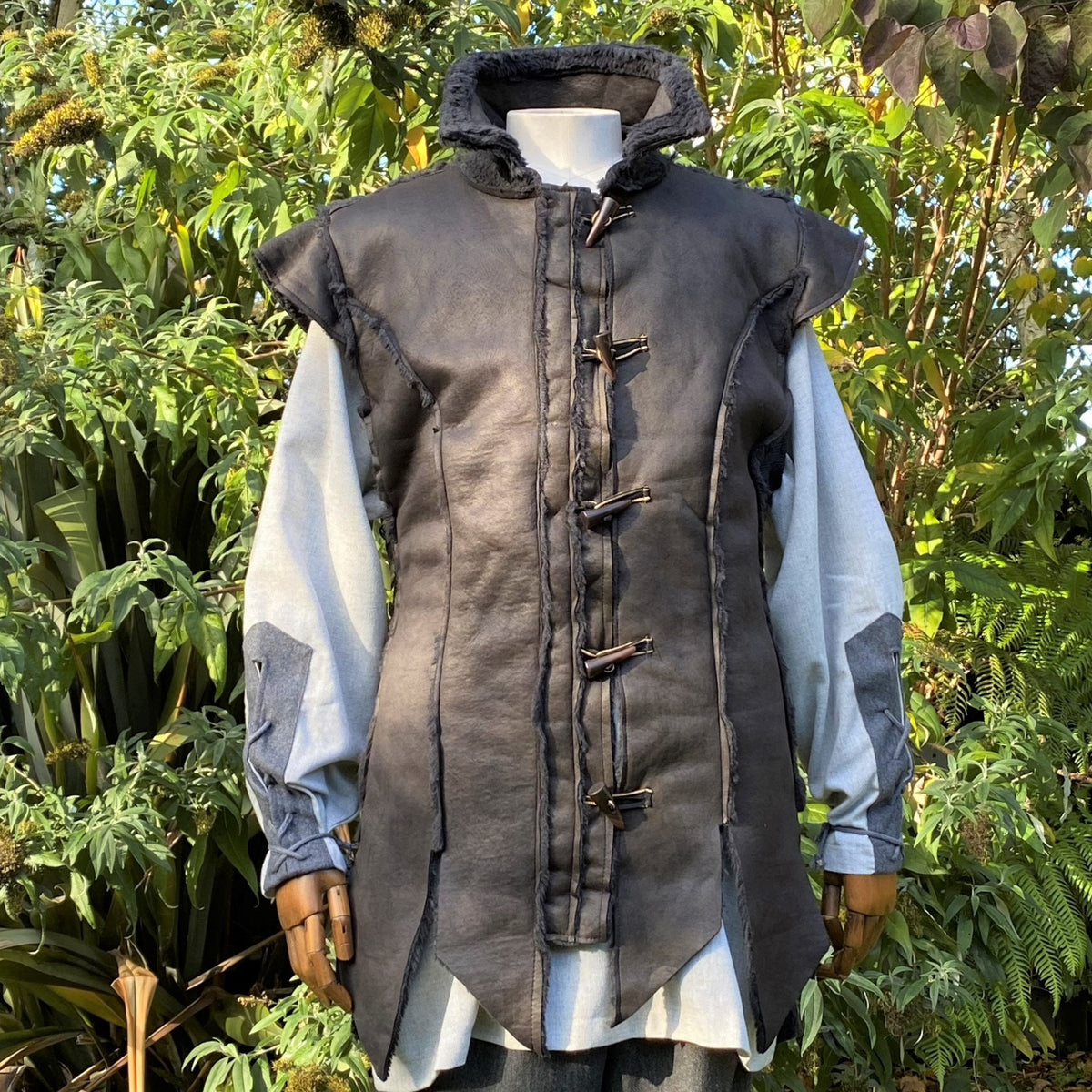 Dark leather waistcoat and shirt for LARP. Front view.
