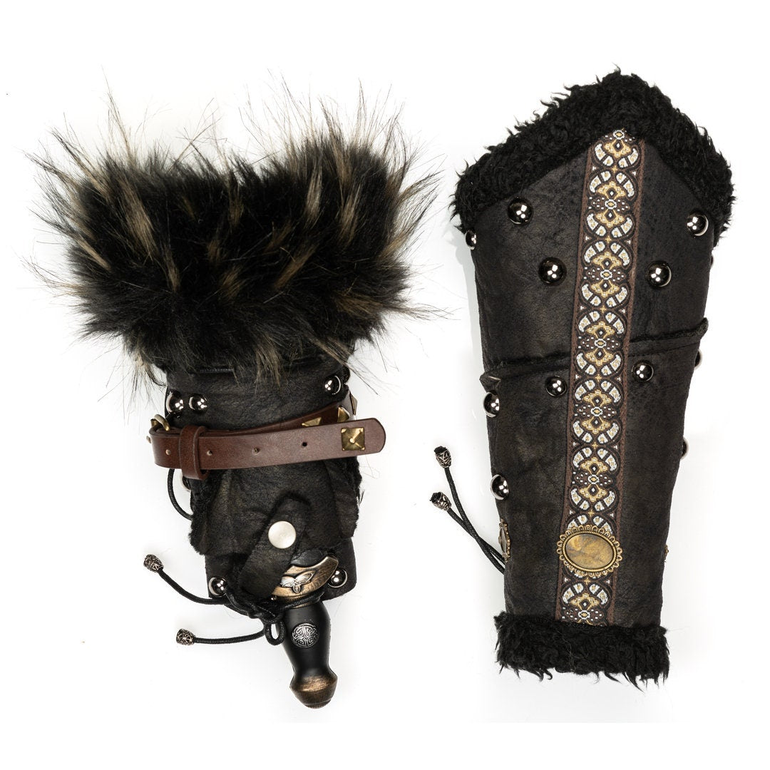 Black medieval LARP vambraces with fur trim and detailed embroidery.