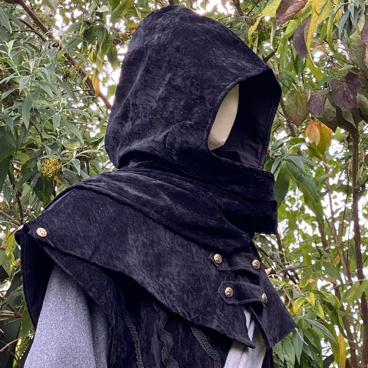 This LARP Hood is Black with a Wrap Around extention. This Viking Scarf Hood is made of Faux Suede Effect, and is Water Resistant and Warm: perfect for your LARP Character and LARP Costume, Cosplay Event, and Ren Faire.