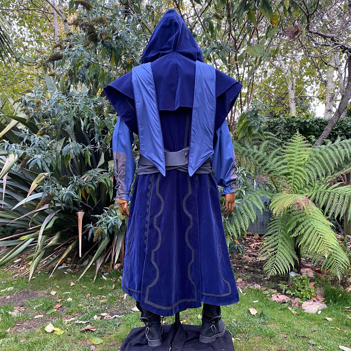 Rear view of blue medieval LARP robe with hood.