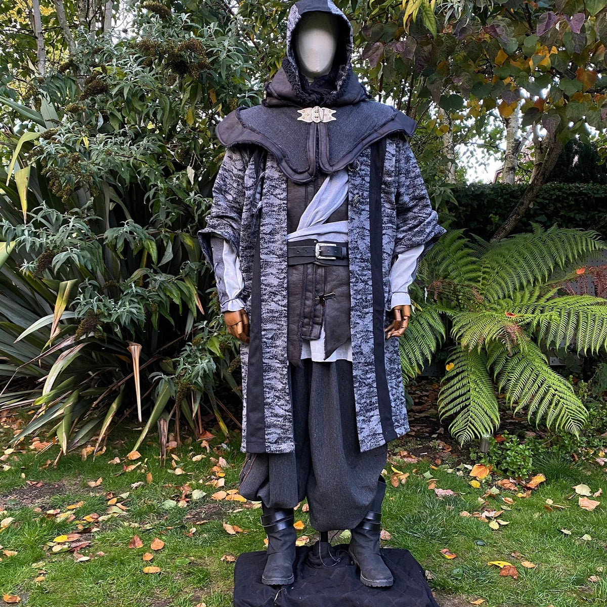 Medieval LARP costume front view, featuring faux leather hood and waistcoat, grey and black.