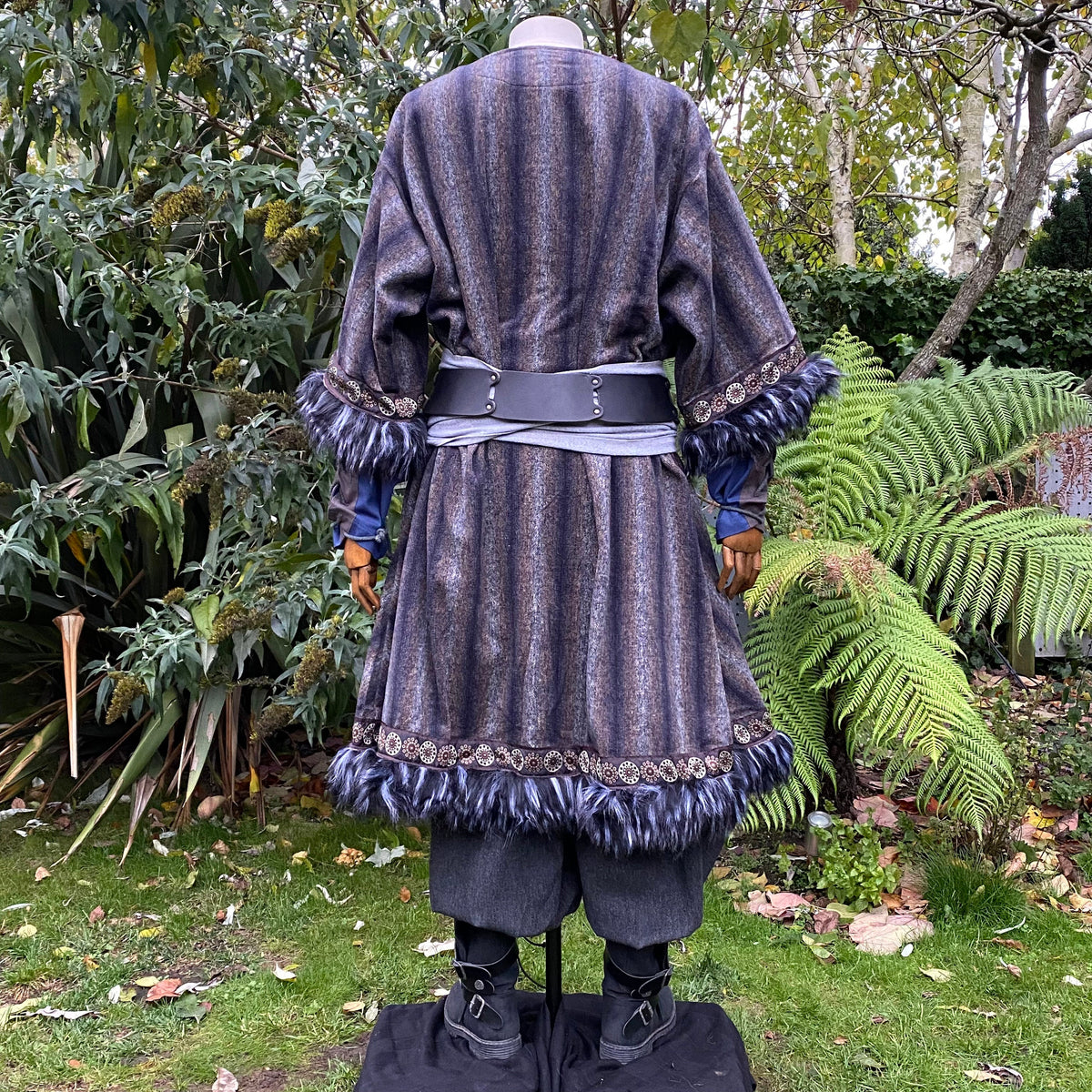 Back view of medieval tunic; blue-grey with fur trim, LARP style belt tied.
