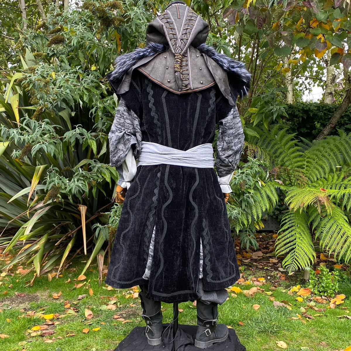 Dark medieval LARP set, back view: black velvet robe, hood, sash, and boots.