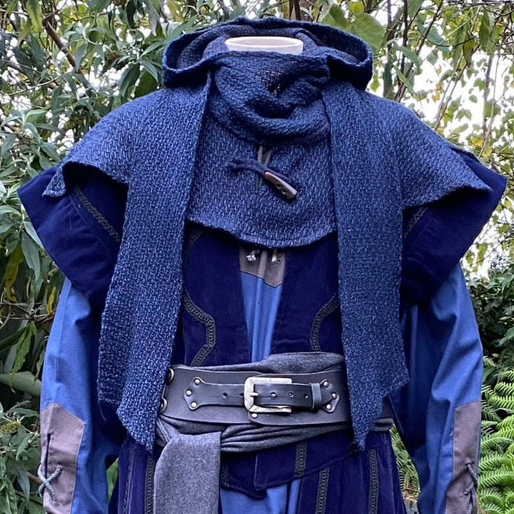 This LARP Hood is Blue with a Wrap Around Woollen extention. This Viking Scarf Hood is Water Resistant and Warm. You can style the Extended arms of the LARP Hood to fit your needs: perfect for your LARP Character and LARP Costume, Cosplay Event, and Ren Faire.