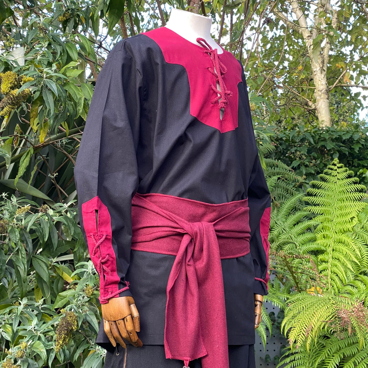 LARP medieval outfit with red sash, black tunic, side.