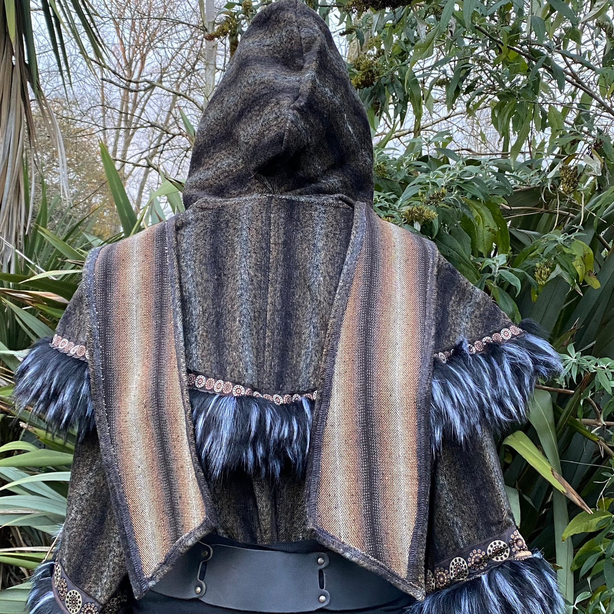 Back view of brown-black LARP hood with faux fur trim and button details.
