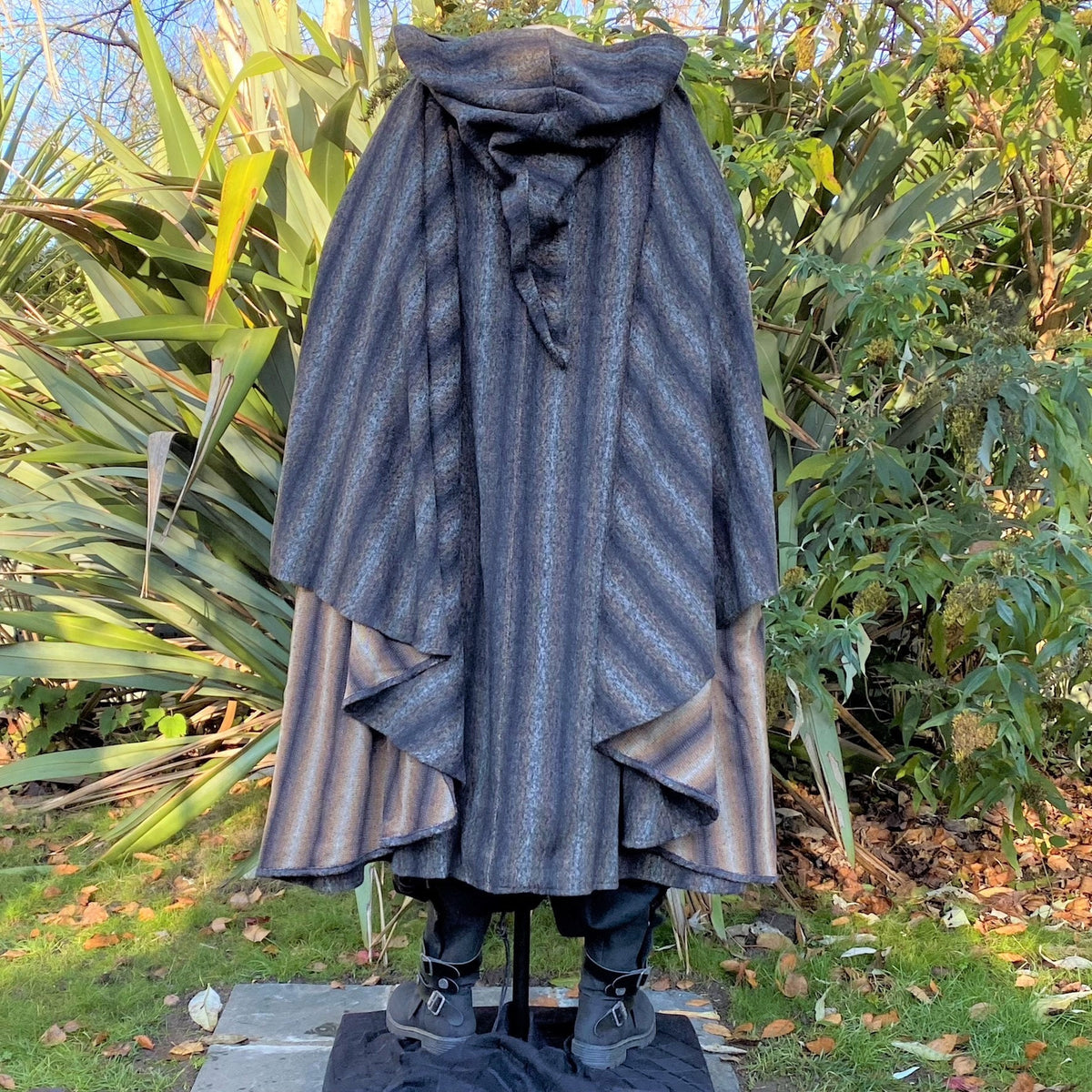 Back view of hooded brown and black striped LARP cloak, medieval fantasy cosplay costume with.