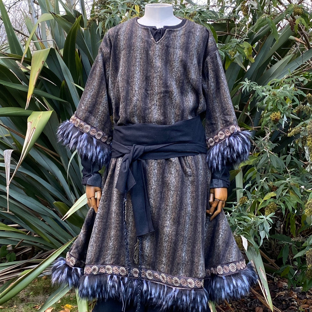 Medieval LARP outfit front view, featuring a grey and black fur trim tunic and matching hood.