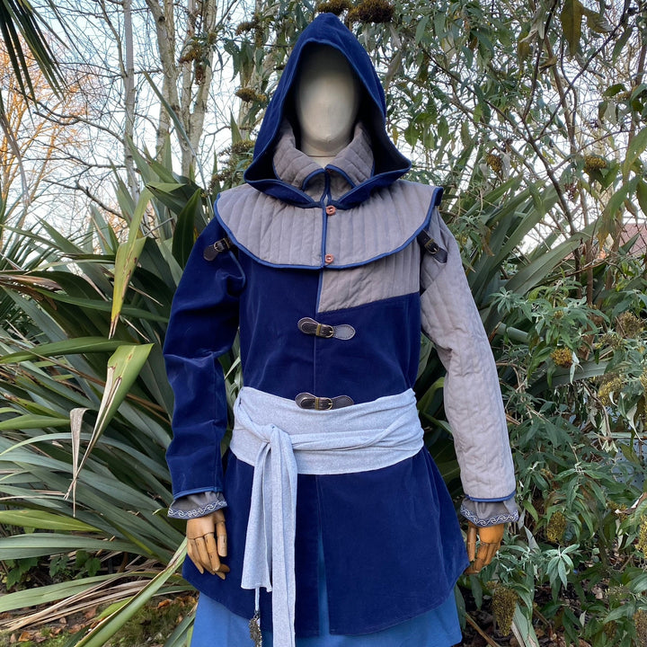 This Padded LARP Hood comes in Blue and Grey Faux Suede. This Viking Hood has a Snood style, and is Water Resistant. The Gambeson Mantle of the Medieval Hood keeps you warm and dry. Perfect for your LARP Character and LARP Costume, Cosplay Event, and Ren Faire.