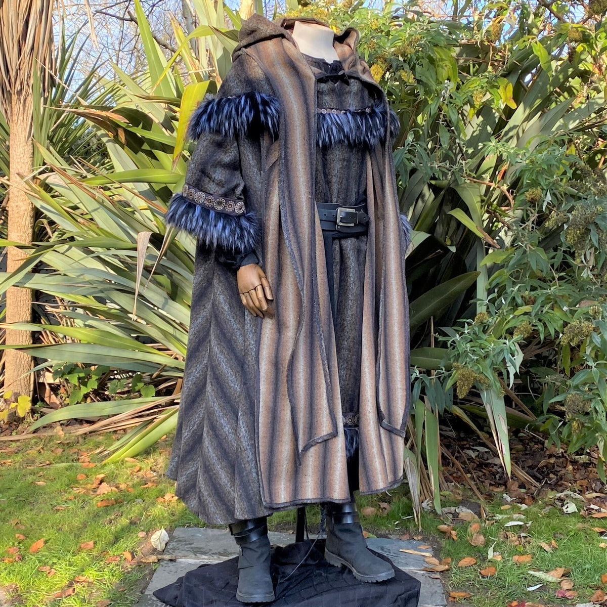 Brown and blue LARP shaman outfit with cloak, tunic, hood, and sash.
