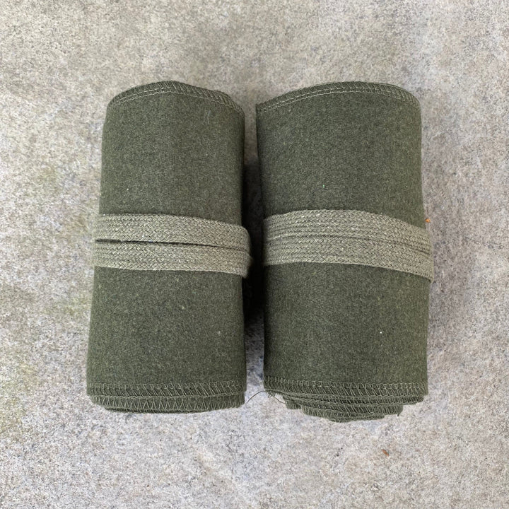 Set of Medieval LARPing Leg Wraps. They are Dark Green and made out of a Wool mixture which are used to keep Trouser flares out of the way and legs warm. These Viking Wraps can wrap around your Legs to provide an extra flare to LARP kit.