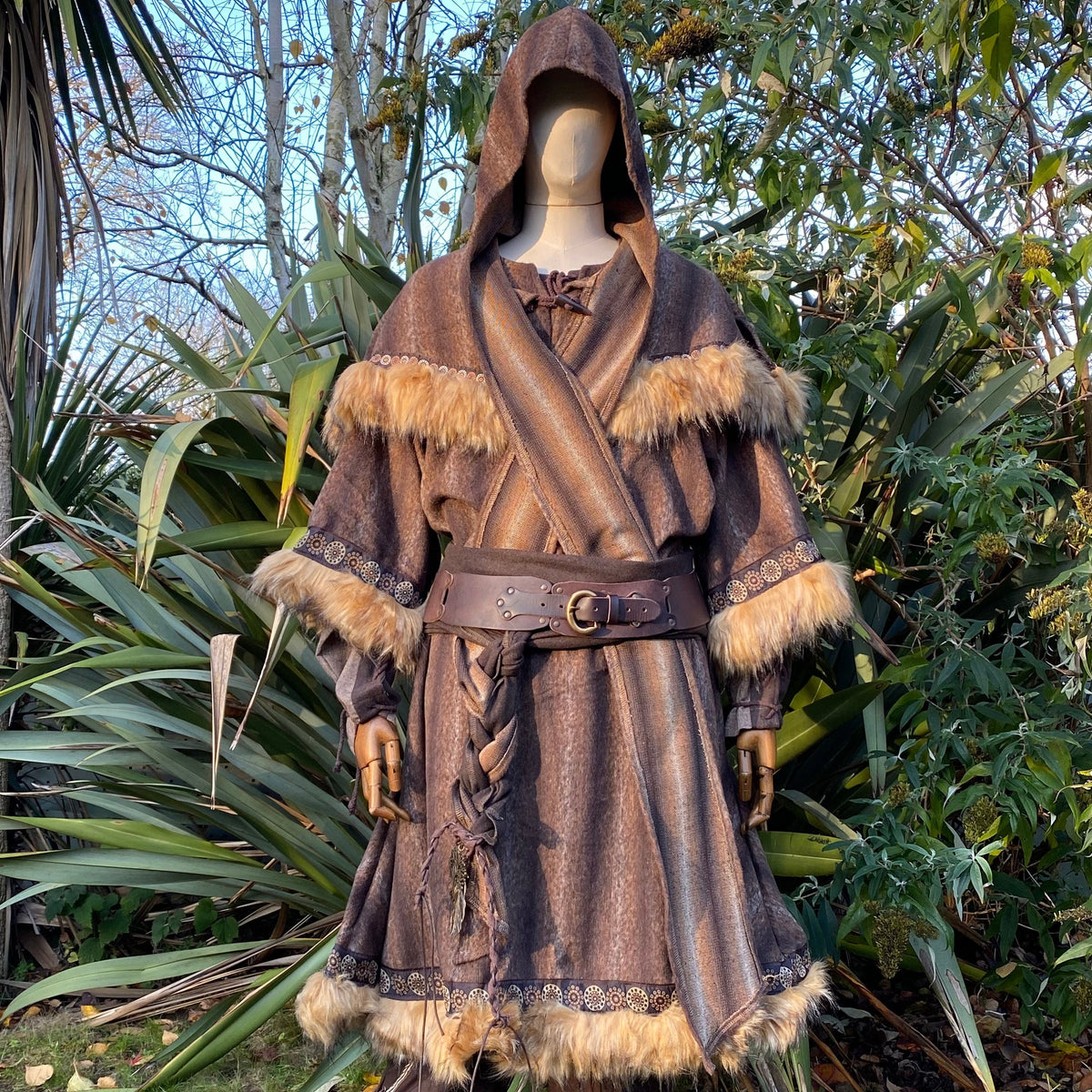 Brown hooded medieval LARP cloak with braided belt and faux fur trim.
