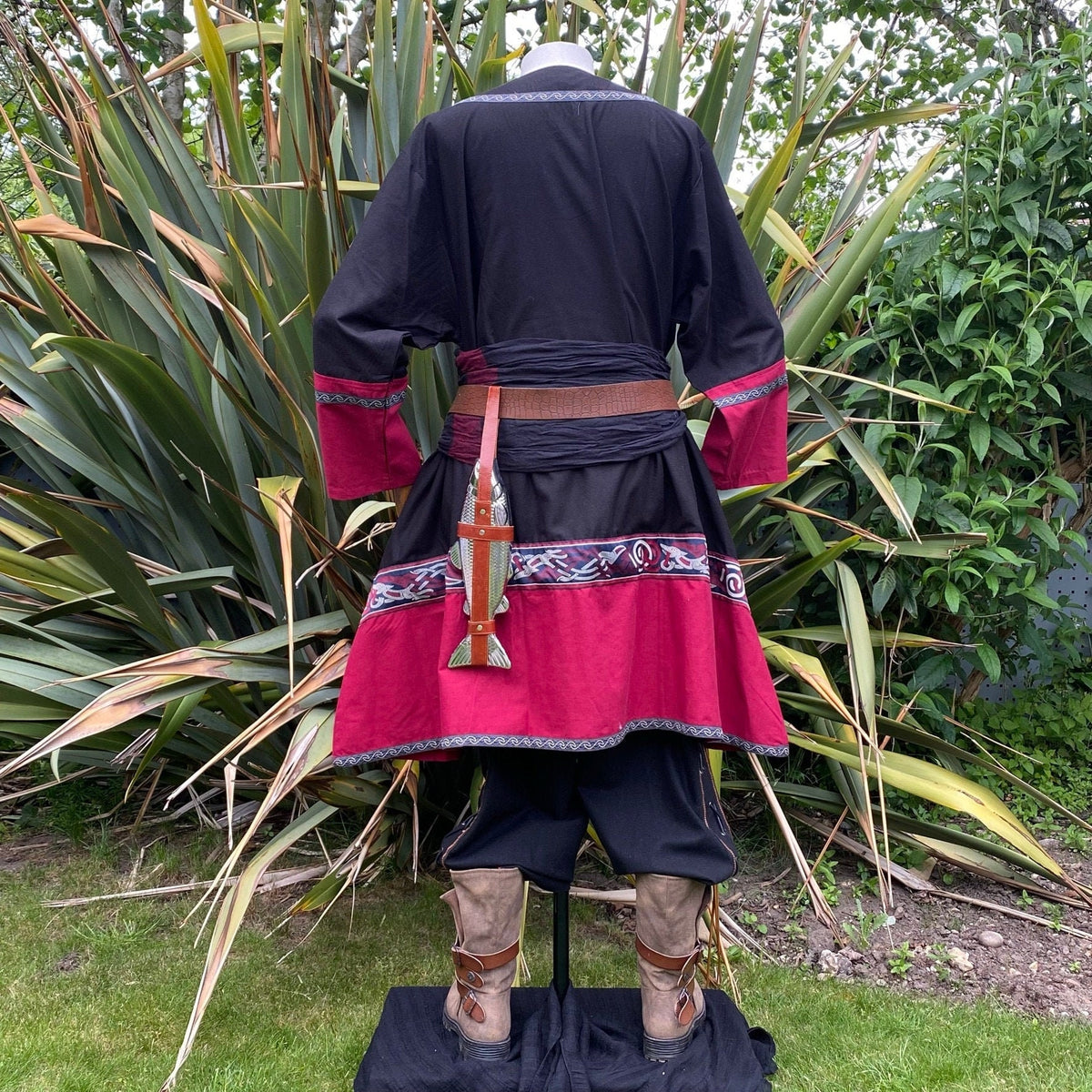 Back view of LARP Viking tunic in black and red with intricate belt embroidery.