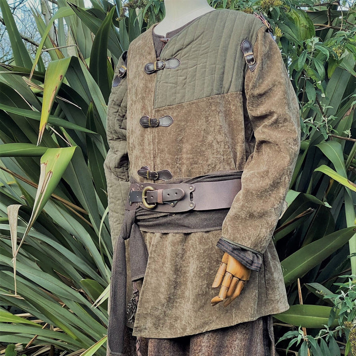 This LARP Gambeson Jacket comes in Green Faux Suede. The LARP Armor has Removeable Sleeves that attach at the shoulder. The Padded Armor is warm and water resistant. This Jacket is perfect for your LARP Costume and LARP Character, Cosplay Events, and Ren Faires.