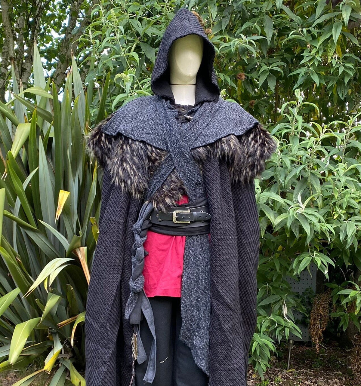 LARP medieval grey hood and mantle with fur details, front view in nature setting.